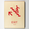 Eco-friendly ADA braille wood sign using 3D printing that says “Exit Upstairs"