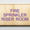 Eco-friendly wood sign using 3D printing that says “fire sprinkler riser room"