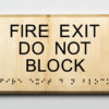 Eco-friendly ADA braille wood sign saying "fire exit do not block"
